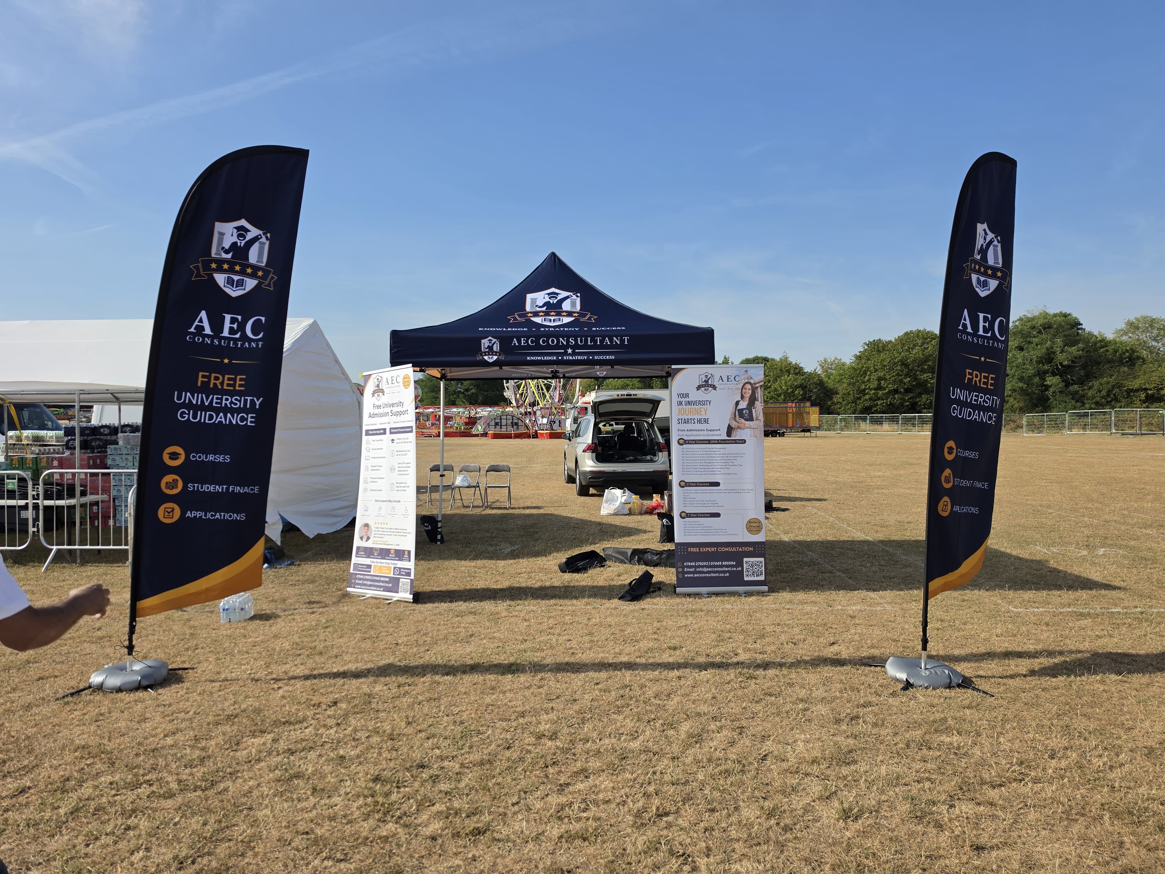 The AEC Consultant gazebo flanked by two feather banners at the UK Goan Festival 2026